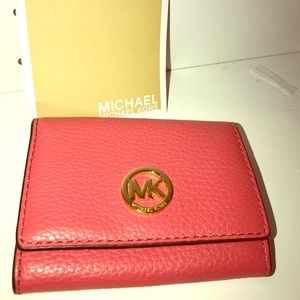 Watermelon snap card case leather. Retails 58.00.