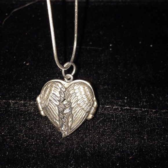 Heart winged locket