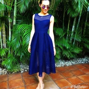 Navy blue open back dress size L available.