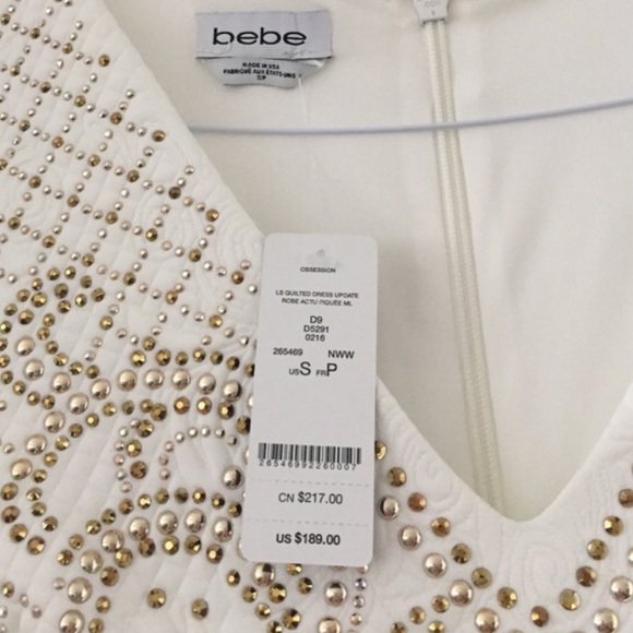 White Bebe  quilted dress with gold accents on top - Picture 3 of 5