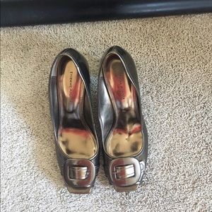 Pair of Etienne Aigner shoes
