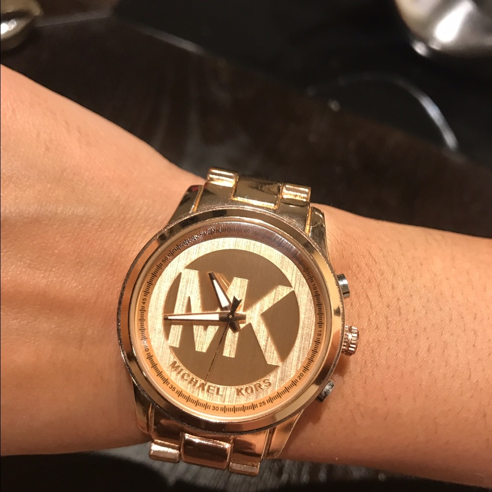 MK rose gold watch