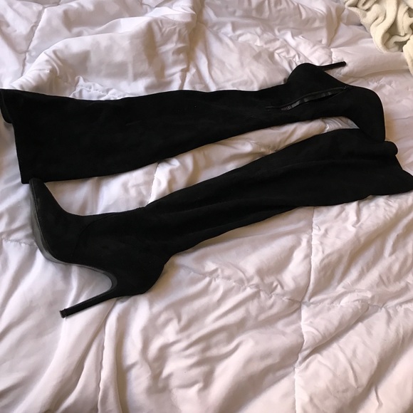 Thigh high black boots