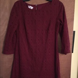 Wine colored lace dress.