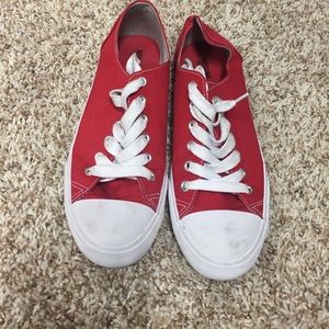 Red tennis shoes. Converse look alike
