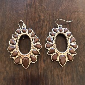 Brown stone earrings.