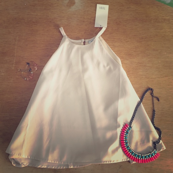 Beige/pinkish flowy crop top. Never worn!