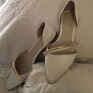 D'orsay flats. White with gold detailing.