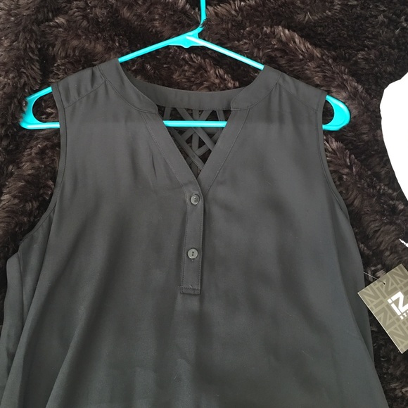 Black tank top, size small, longer in back