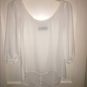 White top with bow on back