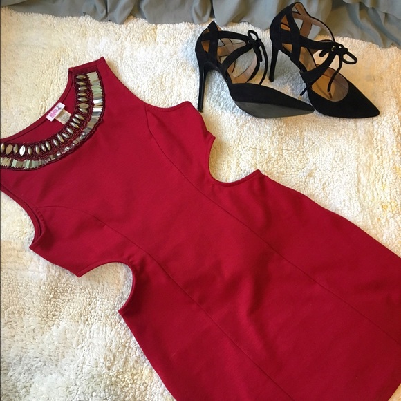 Red bodycon dress with side cutouts