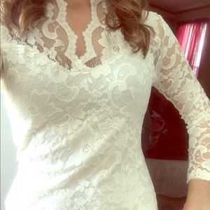 She dress; looks like lace