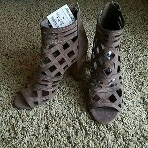 Carlos Santana caged booties