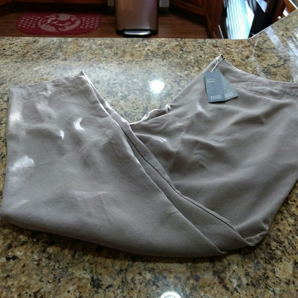 Pleated front slacks.