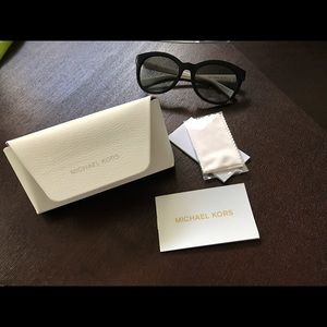 Slightly used women's Michael kits sunglasses.