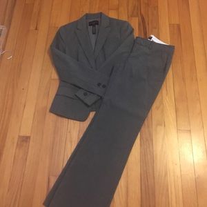 Grey pinstripe suit (jacket and pants)