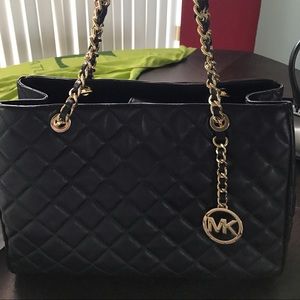 Huge quilted black Michael Kors tote.
