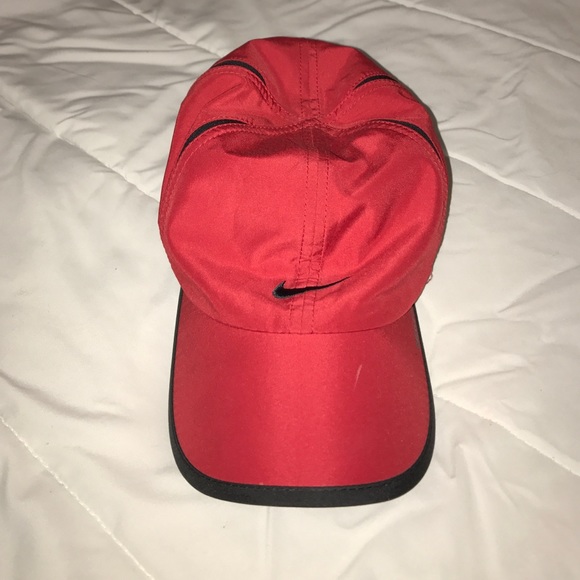 Featherlight black, red dri-fit.