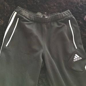Adidas athletic pants. Zippers at the ankles
