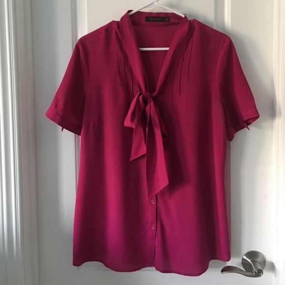 Bright pink blouse.