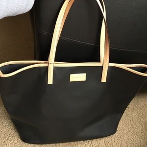 Black and brown leather coach tote bag