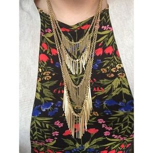 Long gold statement necklace