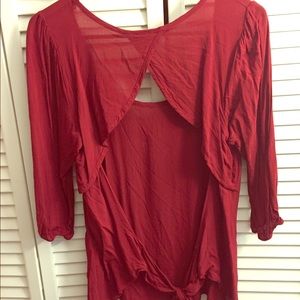 Three quarter length open back blouse