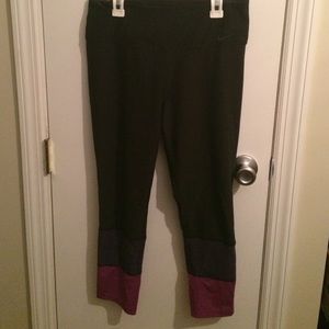 Nike dri fit tights/medium/black w purple details