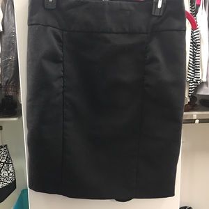 Black pencil skirt with ruffle back