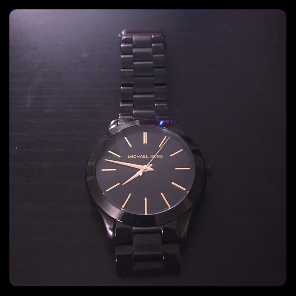 Black and Gold Lightly Used Michael Kors Watch