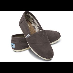 Ash gray TOMS. SIZE 6.5 WIDE