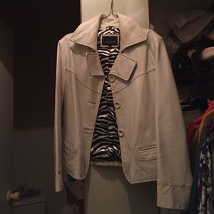 White leather jacket. Fits a true size 12