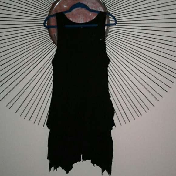 City Chic black jagged ruffle tunic.