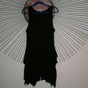 City Chic black jagged ruffle tunic.