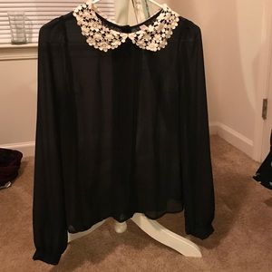 Sheer black shirt with white Peter Pan lace collar