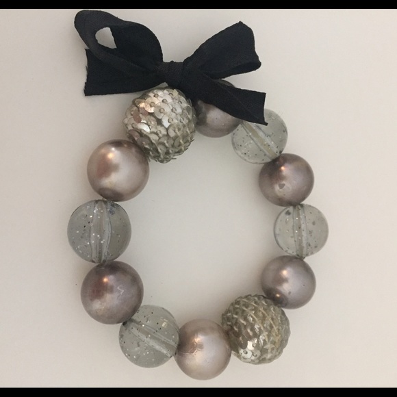 Large bead bracelet with ribbon bow tie