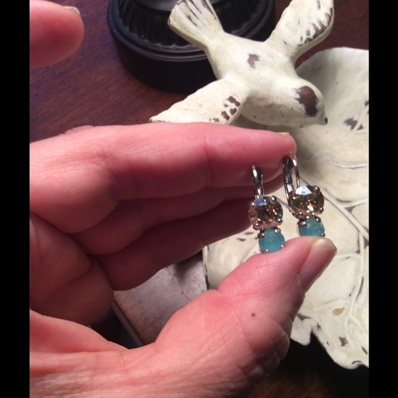 Custom made earrings. Very pretty level backs.