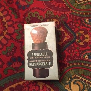 Bare minerals refillable mini buff brush.
