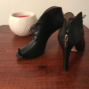 Black leather peep toe booties