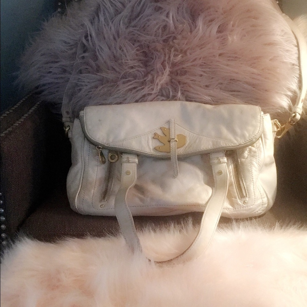 Beautiful bag , very well taken care of  .