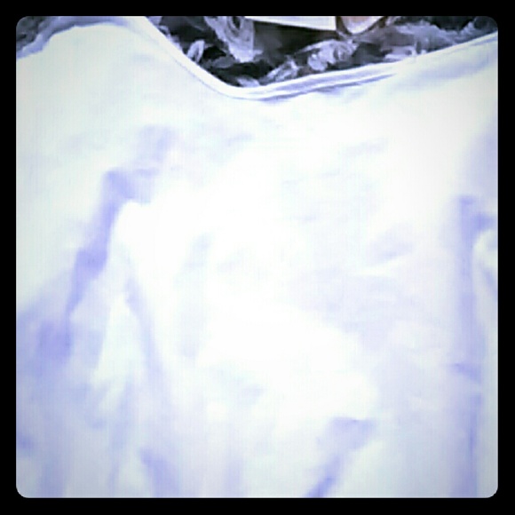 A white and green holey shirt