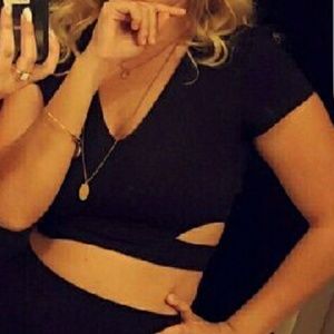 Bebe black crop top with side cutouts