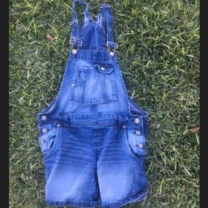 Distressed overalls.