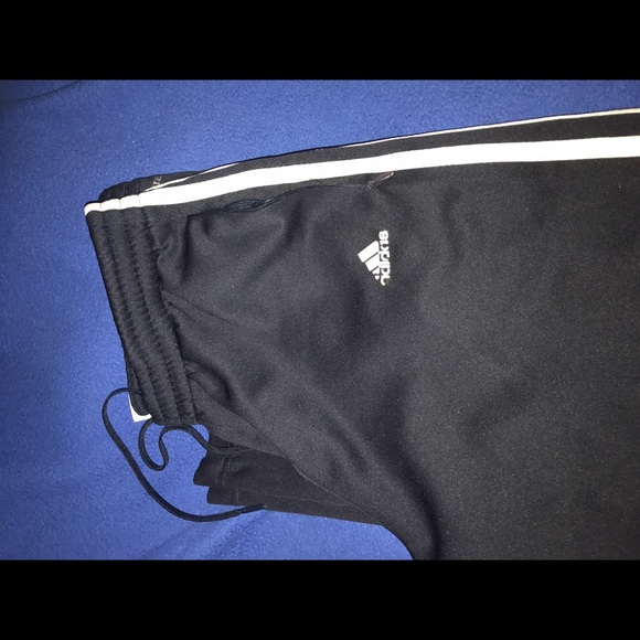 Adidas sweat pants.