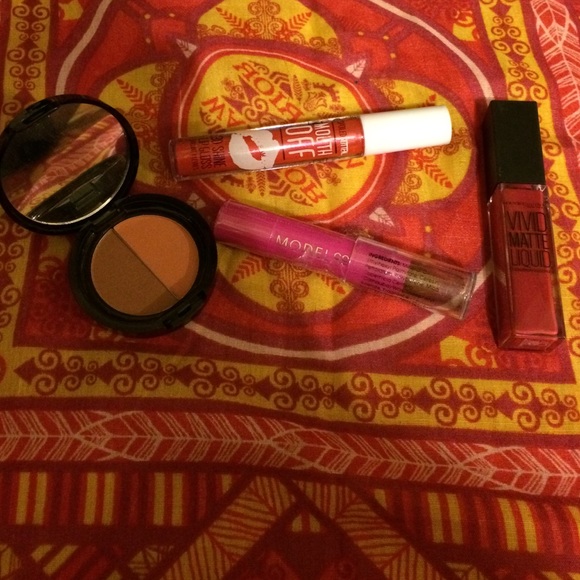 Bronzer, contour stick, lip stick and gloss