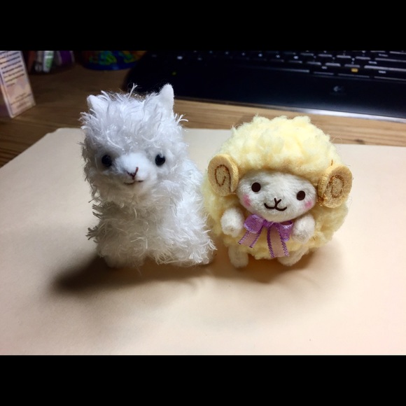 Two small accessory dolls