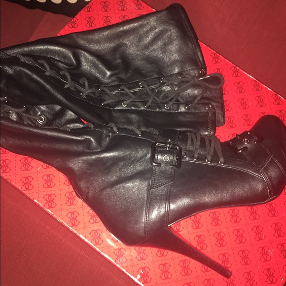 Over the knee tie up boots.