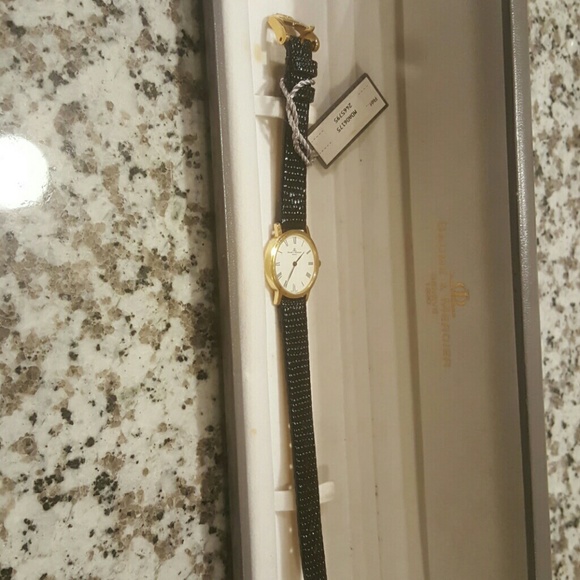 Buame and Mercier 14k gold geneve