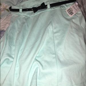 Skirt with. Belt- never worn was 15.80