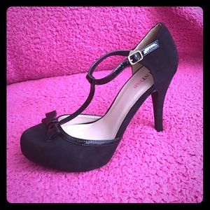 Just Fab Black T-Strap Pump with a bow.